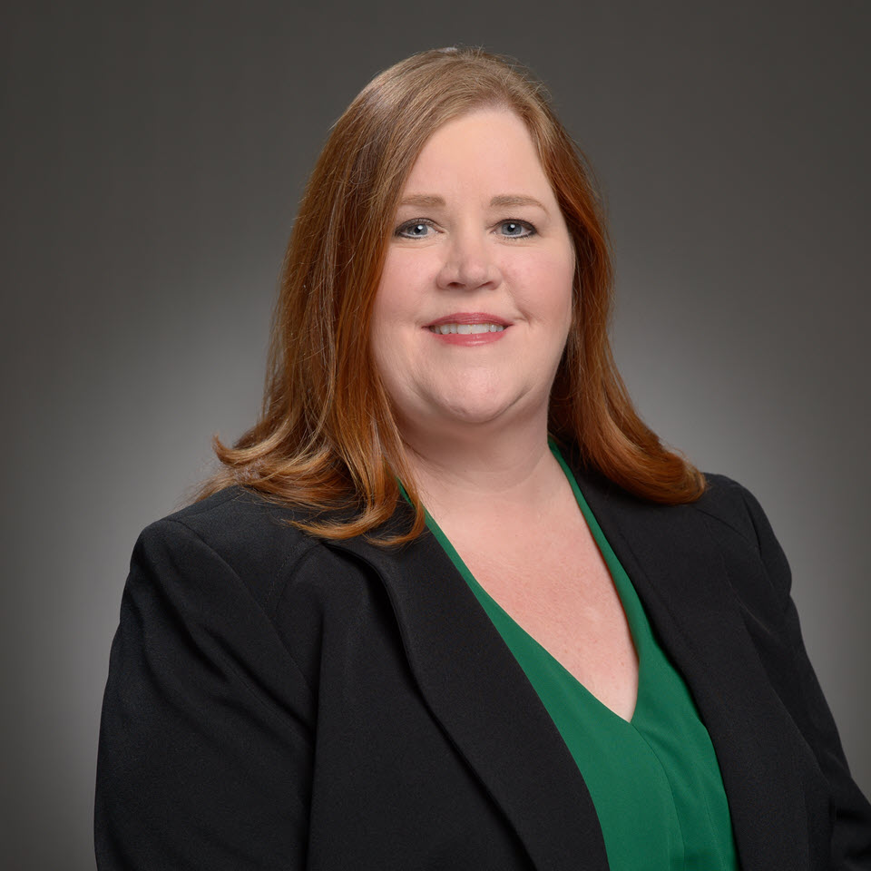 A headshot of Holly Evans, MBA