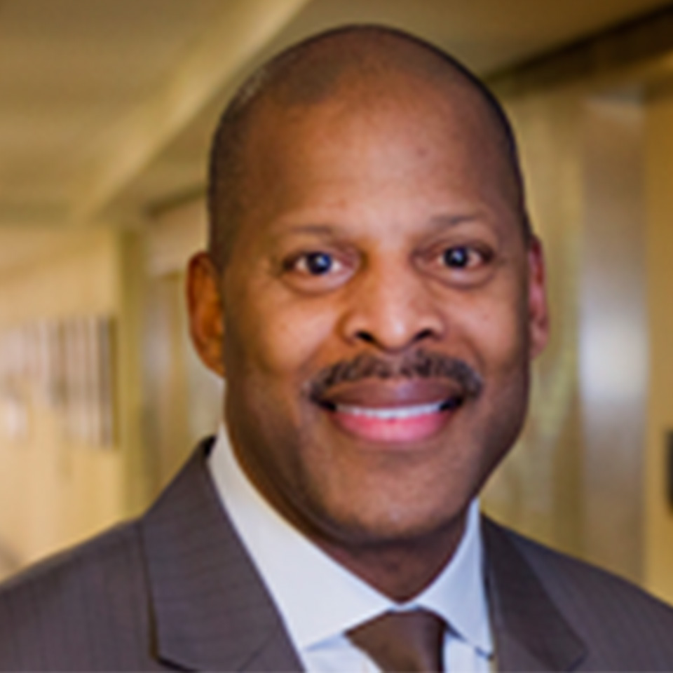 A headshot of Walter Harris, MBA
