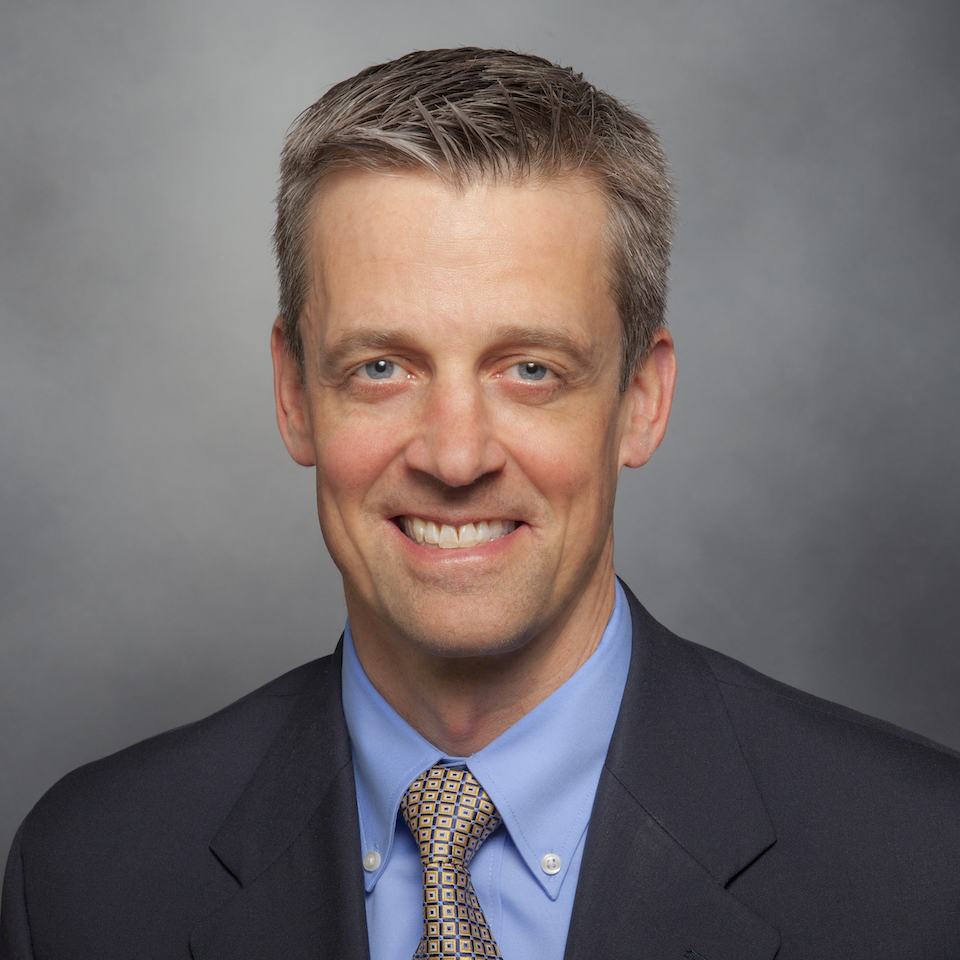 A headshot of Craig W. Robbins, MD, MPH