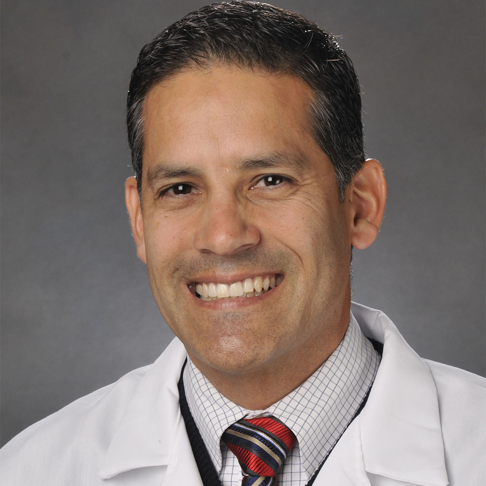 A headshot of Anthony E. Burgos, MD, MPH