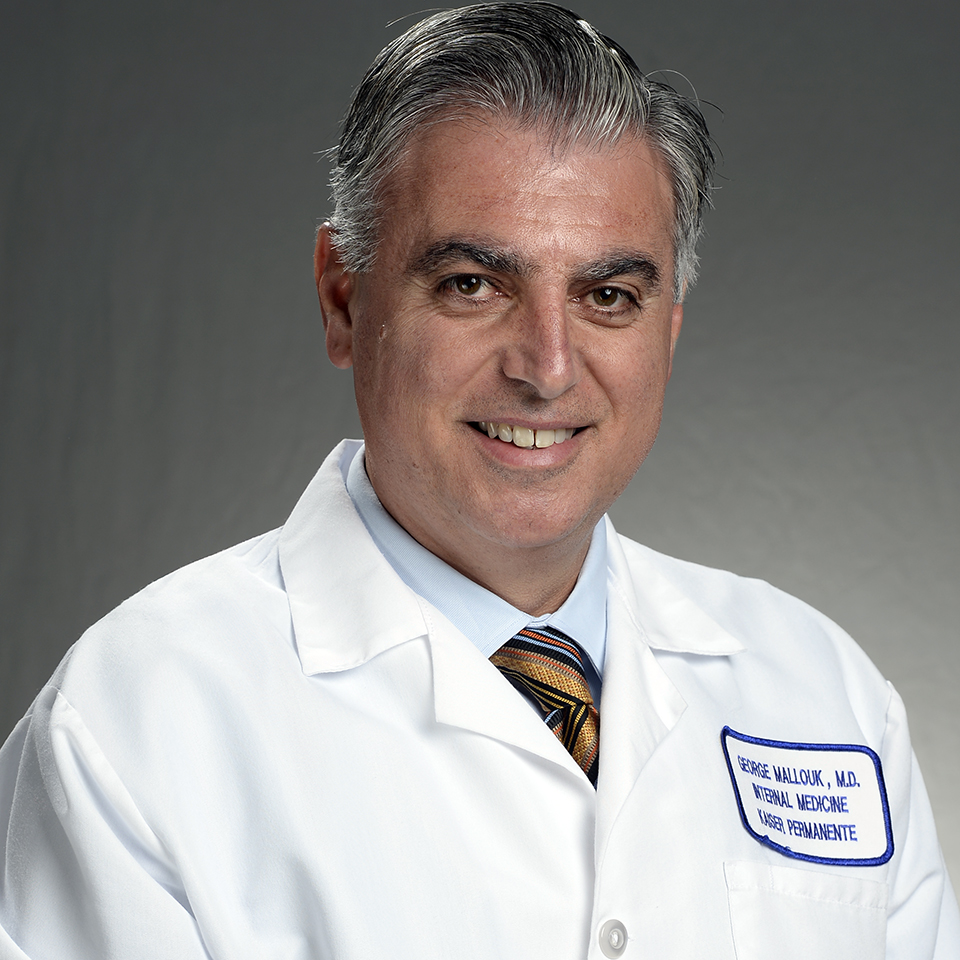 A headshot of George Mallouk, MD
