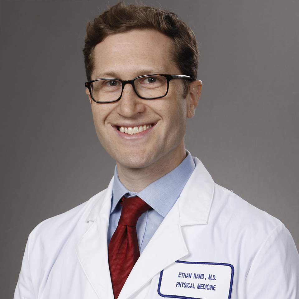 A headshot of Ethan B. Rand, MD