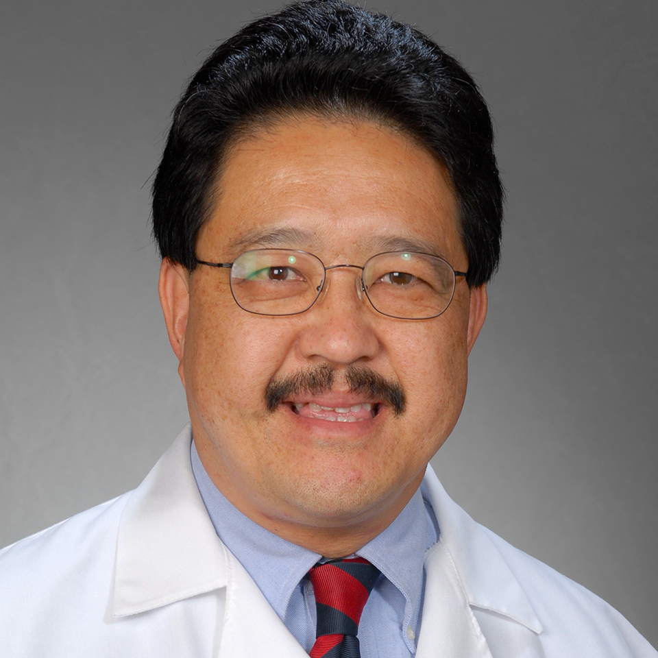 A headshot of Thomas Y. Tom, MD, FACP