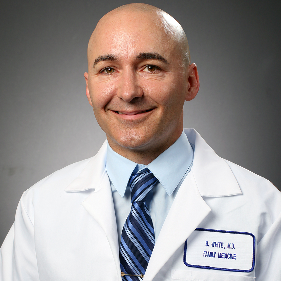 A headshot of Brett A. White, MD, FAAFP