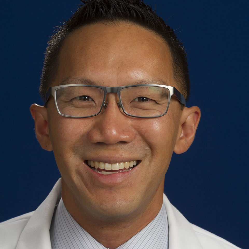 A headshot of Christopher Yue-Yun Woo, MD, MS, FACC