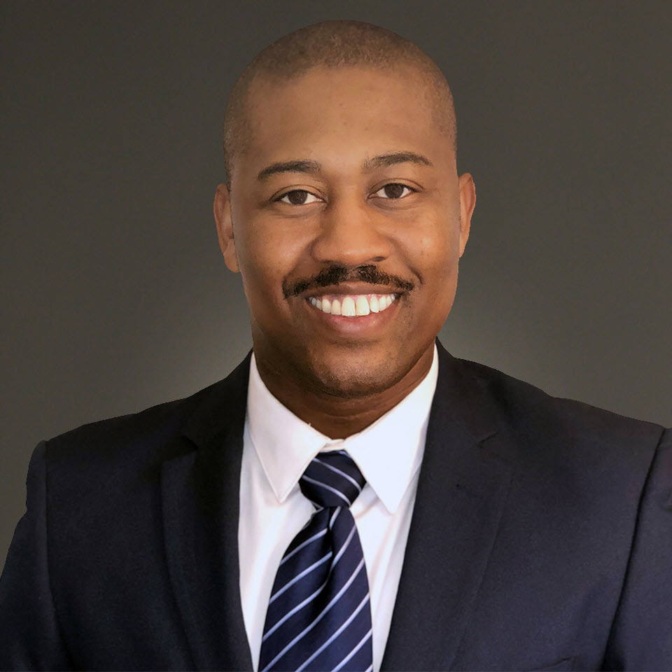 A headshot of Troy Elam, MBA