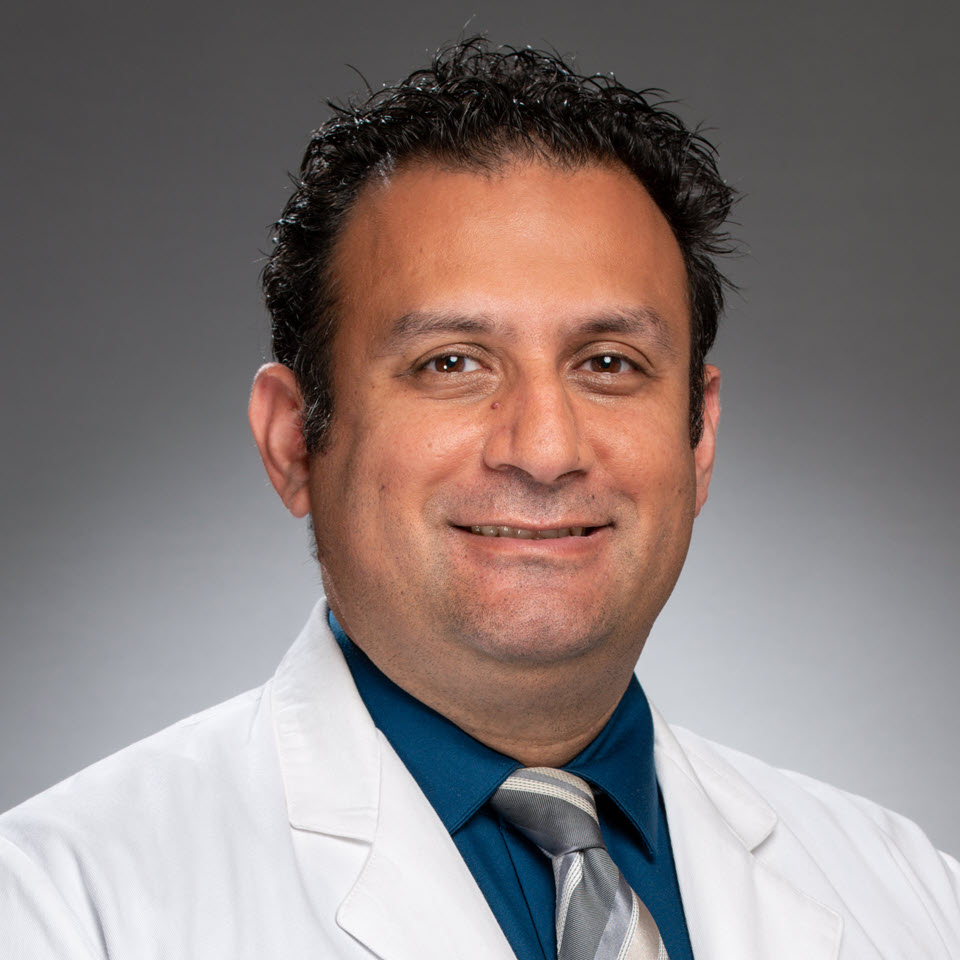 Profile headshot of Iden Andacheh, MD