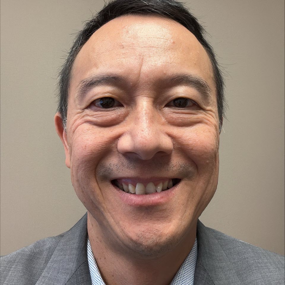 Profile headshot of Nhan (Peter) Huynh, MD