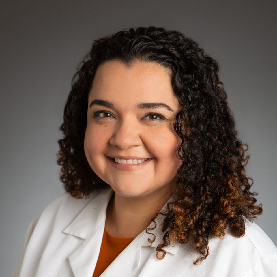 A headshot of Alma A. Lopez, MD