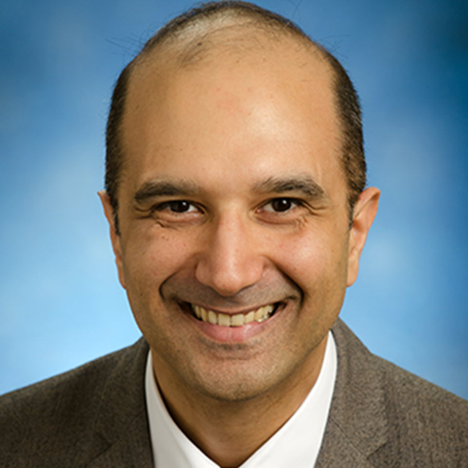Profile headshot of Ali Poyan Mehr, MD