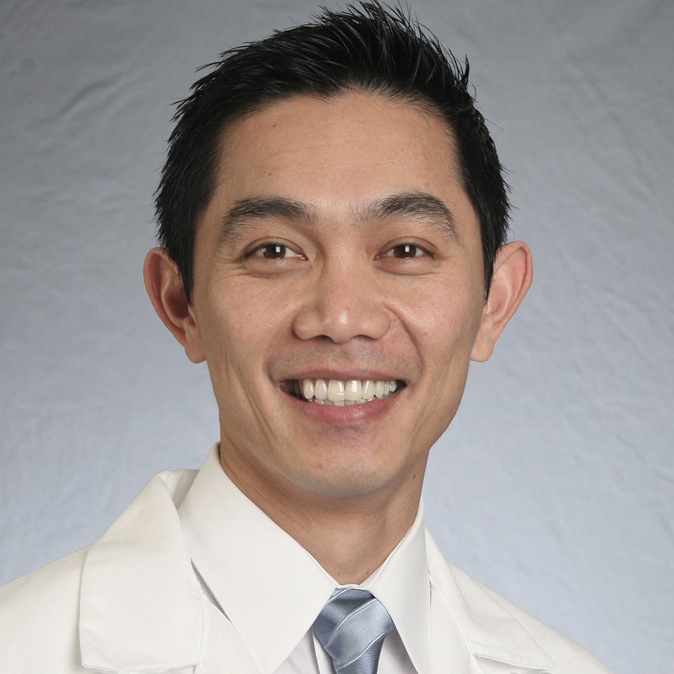 Headshot image of Brian-Linh D. Nguyen, MD, MBA, MTOM