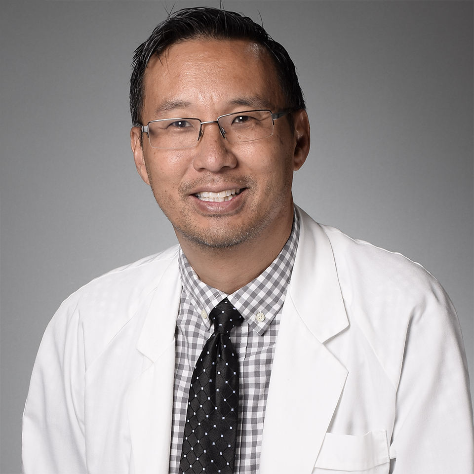 A headshot of Anson Yew, MD