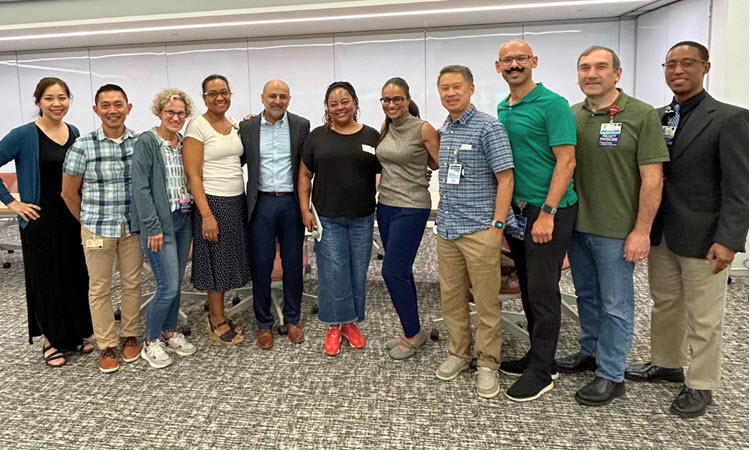 Left to Right: Joyce Wong Taur, MD, MPH (REACH Coach), Brian-Linh Nguyen, MD, MBA, MTOM (Faculty Director, REACH Course), Colleen Wittenberg, MD, FACOG (REACH Coach), Nicole Lawson, PhD (Faculty Director, Inclusive Curriculum), Deepthiman (Deepu) Gowda, MD, MPH, MS (Assistant Dean, Medical Education), Nikki High (Founder, Octavia's Bookshelf), Jereme Patricia Butler, MD (REACH Coach), Rolando Kuo-Yang Tang, MD (REACH Coach), Fady N. Mikhael, DO, FAAP (REACH Coach), Garo K. Balkian, MD, FAAEM (REACH Coach) Shakir E. Emel, MD (REACH Coach)