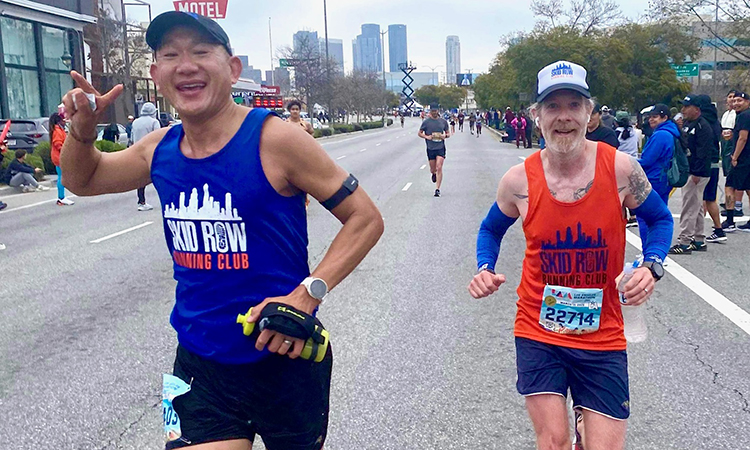 KPSOM faculty member John Su (left) at the 2023 Los Angeles Marathon. At right is Brian Charest, Assistant Professor of Education with the University of Redlands, who also volunteers with the run club. (Photo courtesy John Su)