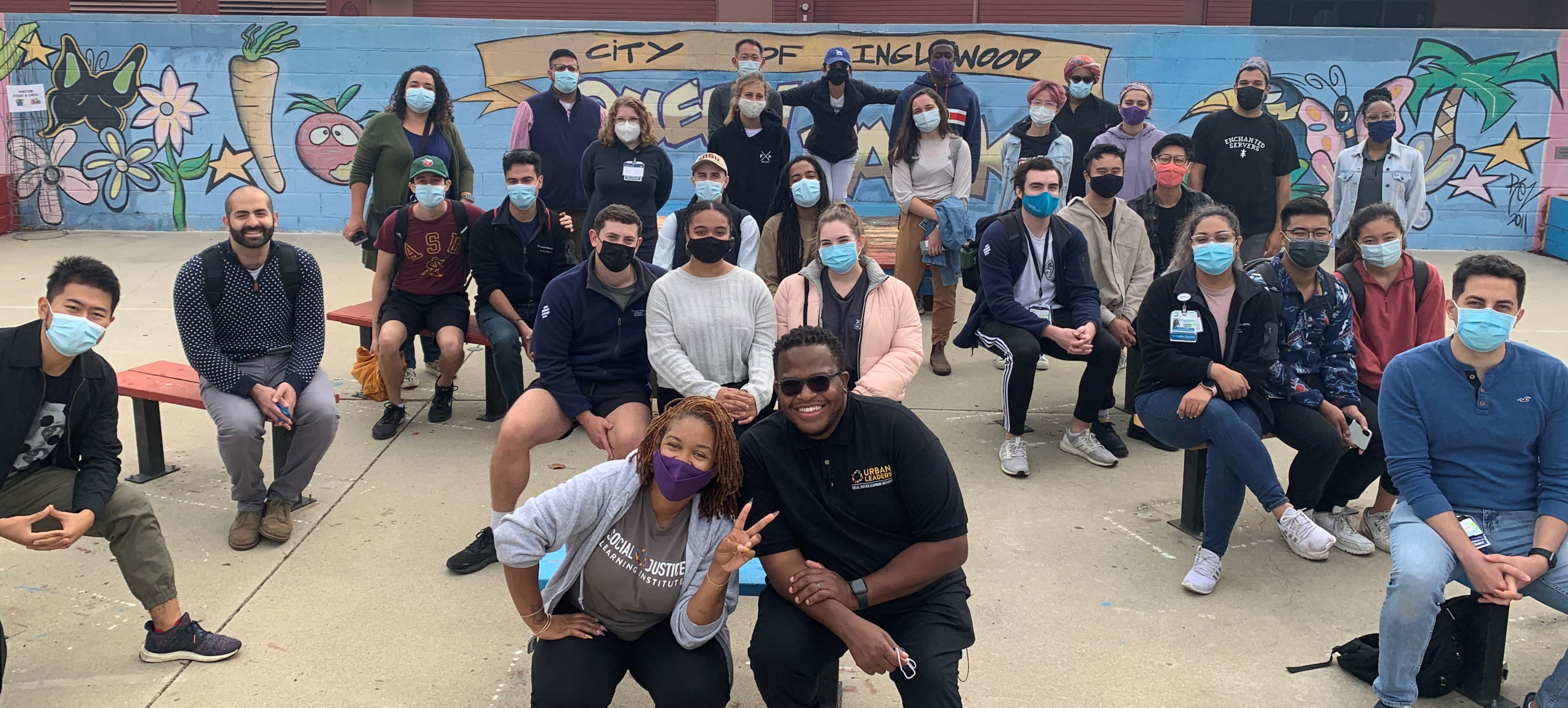 KPSOM students visiting Queen Community Garden with the Social Justice Learning Institute (SJLI) in Inglewood, Calif. Students learn about the successes of community organizing and grassroots efforts to advance food justice.